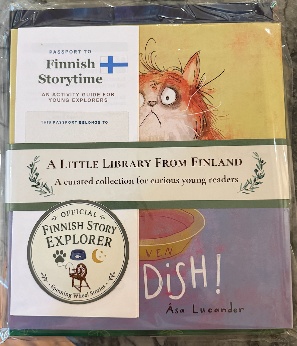 A Little Library From Finland wrapped gift set with activity passport and Finnish Story Explorer sticker